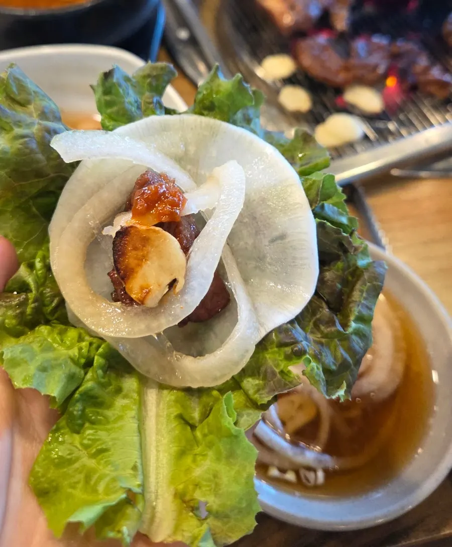A lettuce wrap filled with grilled galbi
