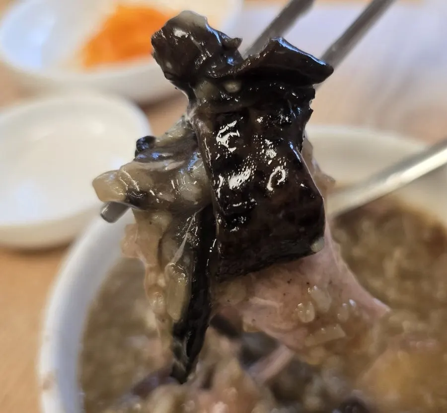 Rich baeksuk broth with neungi mushroom