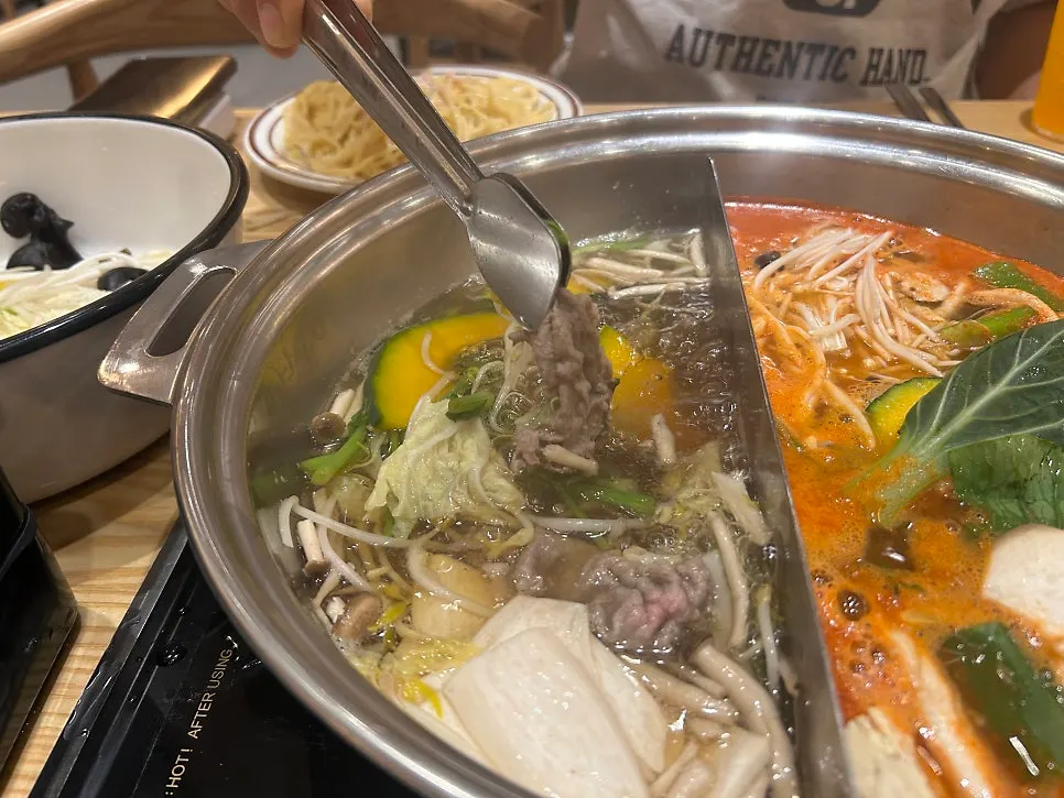 Seasoned fried chicken served alongside shabu-shabu