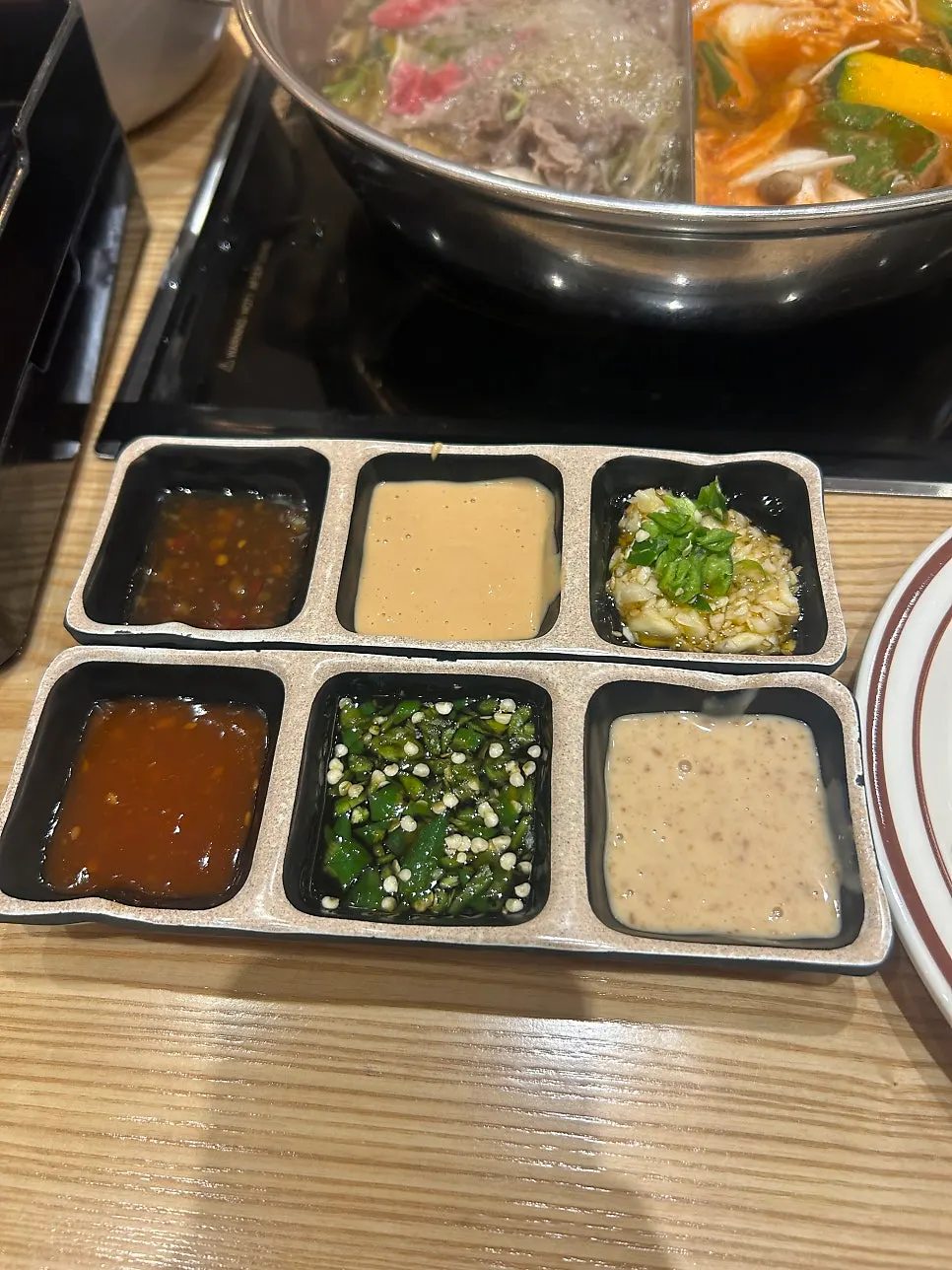 Vegetables and meat cooking in broth