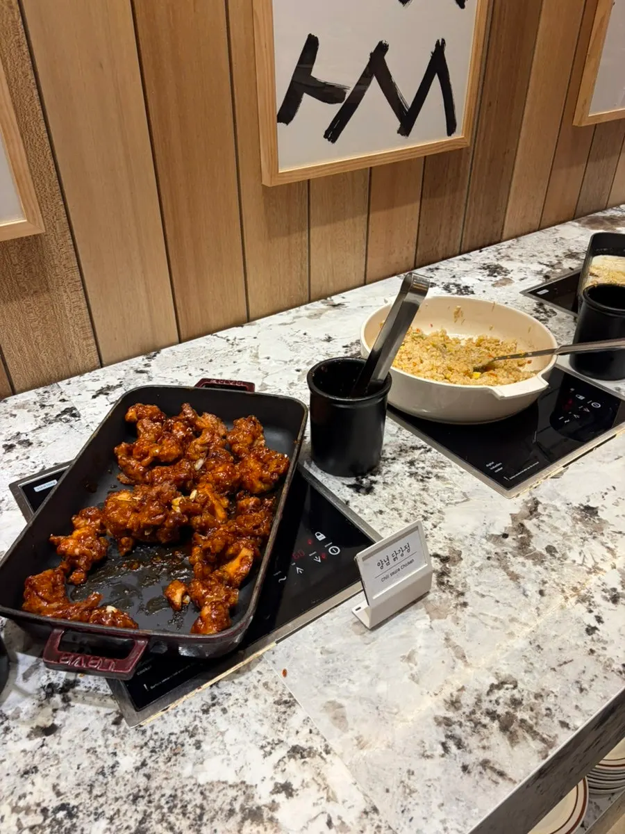 Side dishes including LA galbi and fried chicken