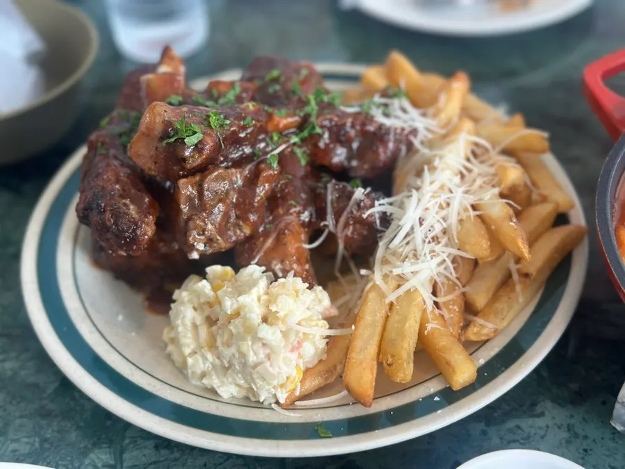 A plate of When You Bite's signature BBQ pork ribs
