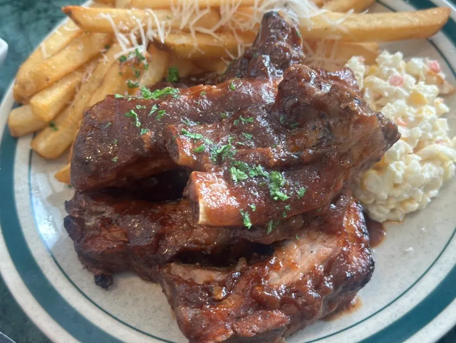 Close-up of BBQ pork ribs with meat falling off the bone