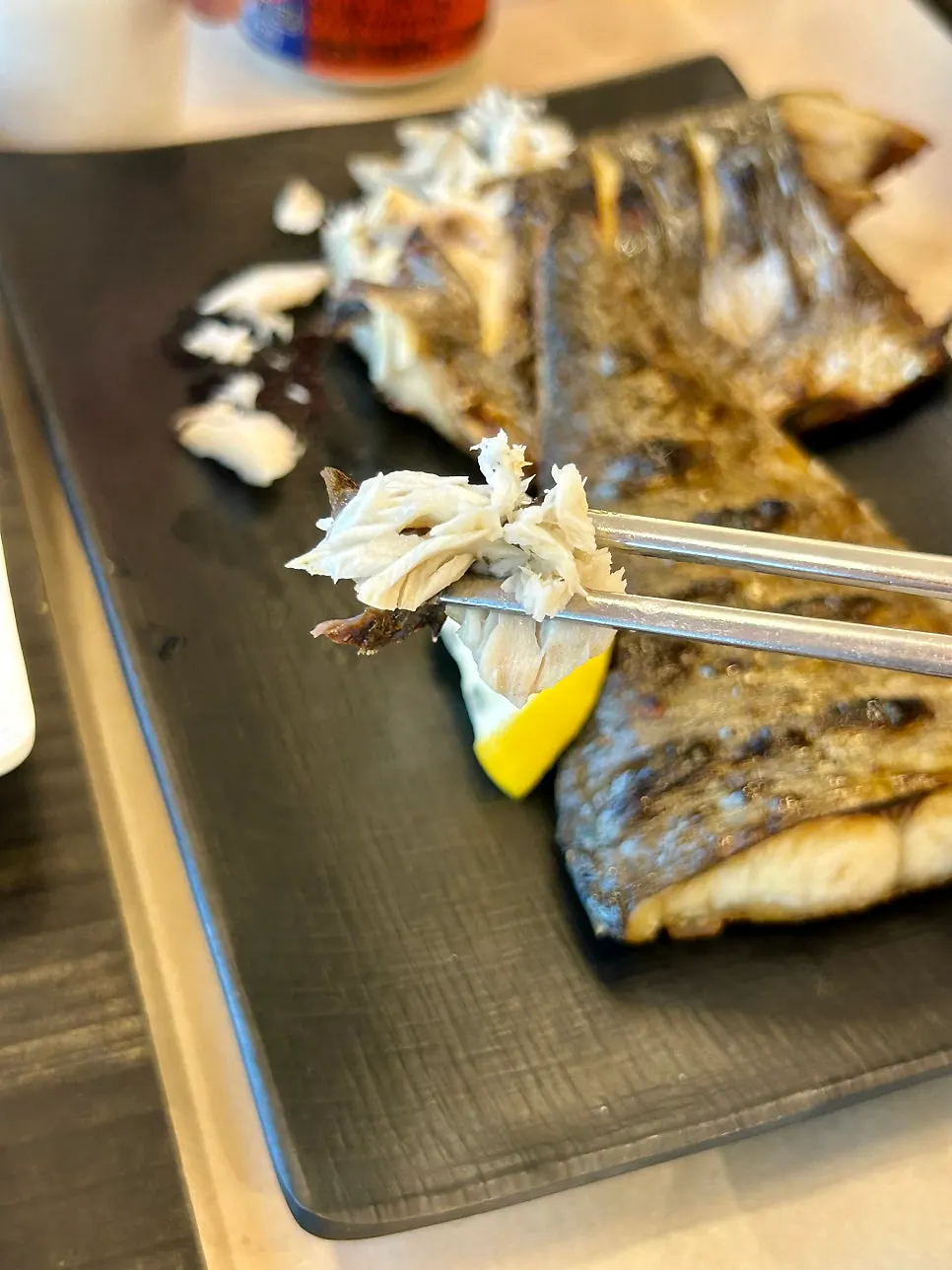 Two thick pieces of grilled Spanish mackerel