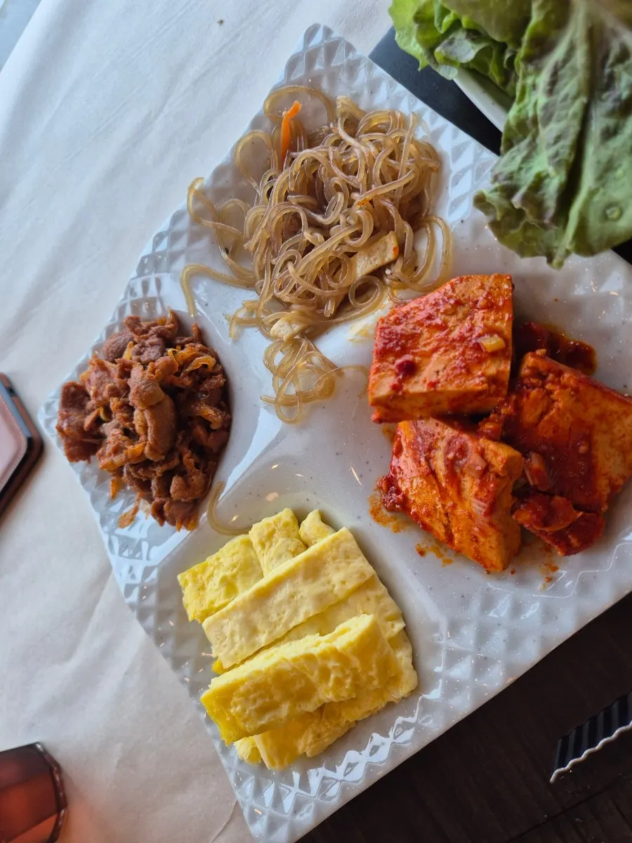 Japchae and rolled egg picked from the self-serve bar