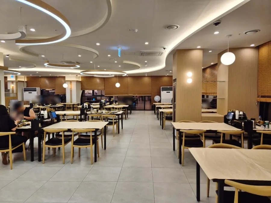 Seating inside the restaurant under soft lighting