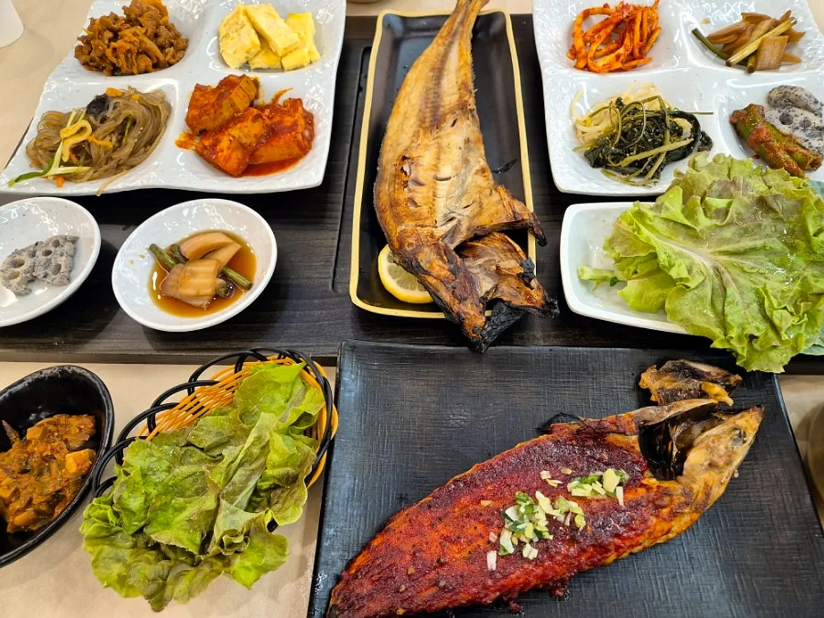 A hearty spread of Korean side dishes gathered from the self-serve bar