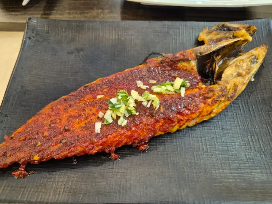 Two grilled fish fresh from the hearth