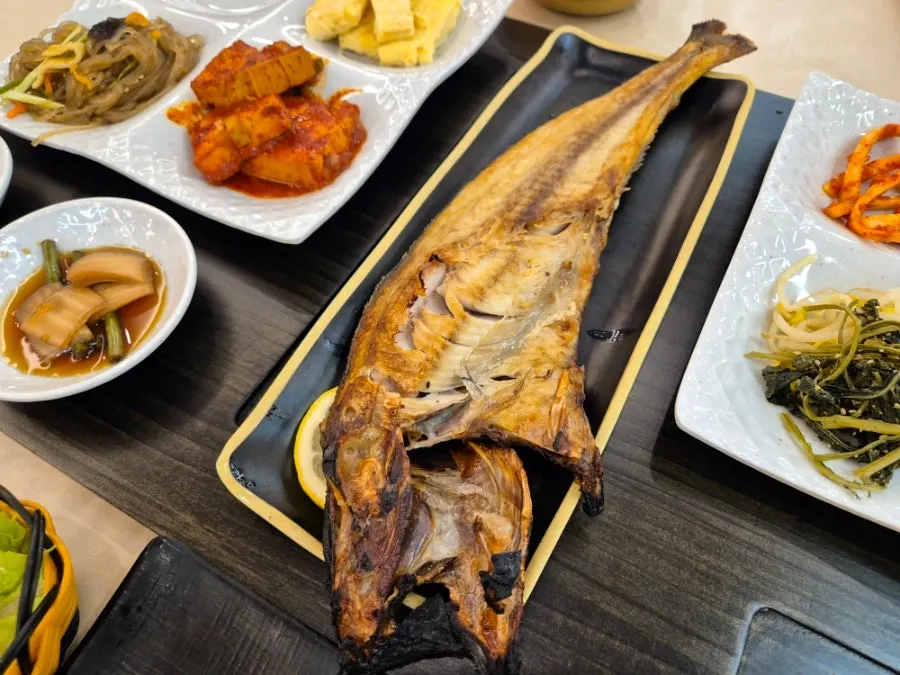 Close-up of seasoned grilled mackerel coated in special sauce