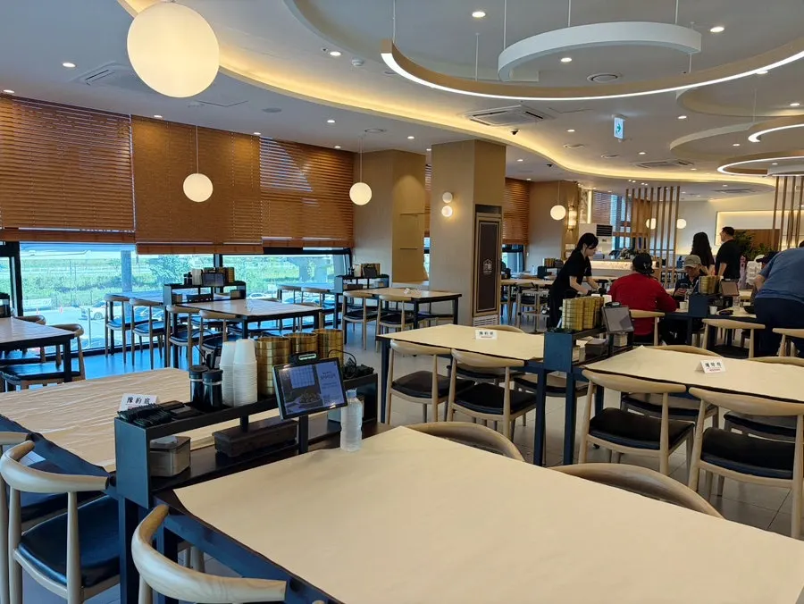 Quiet dining hall tables during weekday lunch