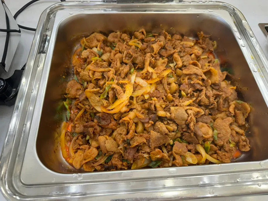 Self-serve bar stocked with a variety of side dishes