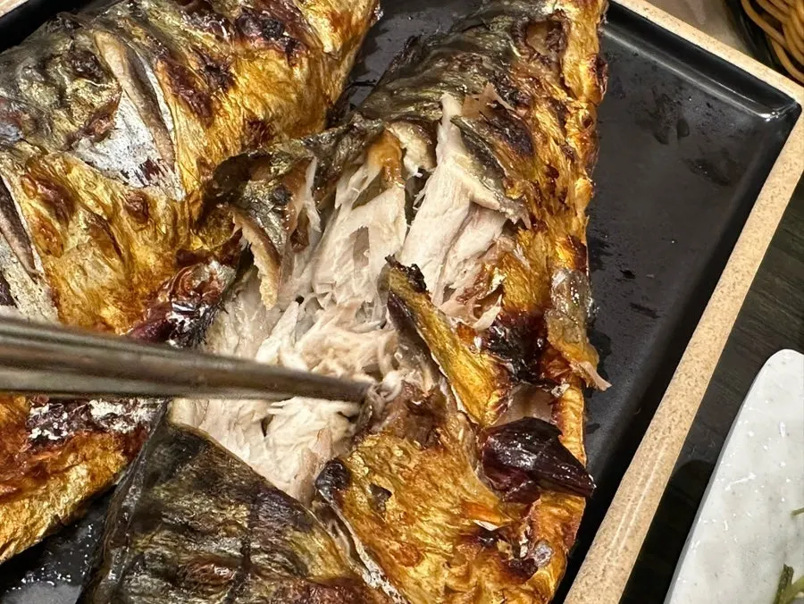 A generously sized piece of grilled mackerel