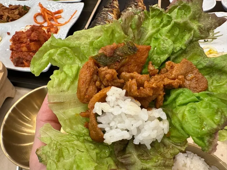 Plate of stir-fried pork brought from the self-serve bar