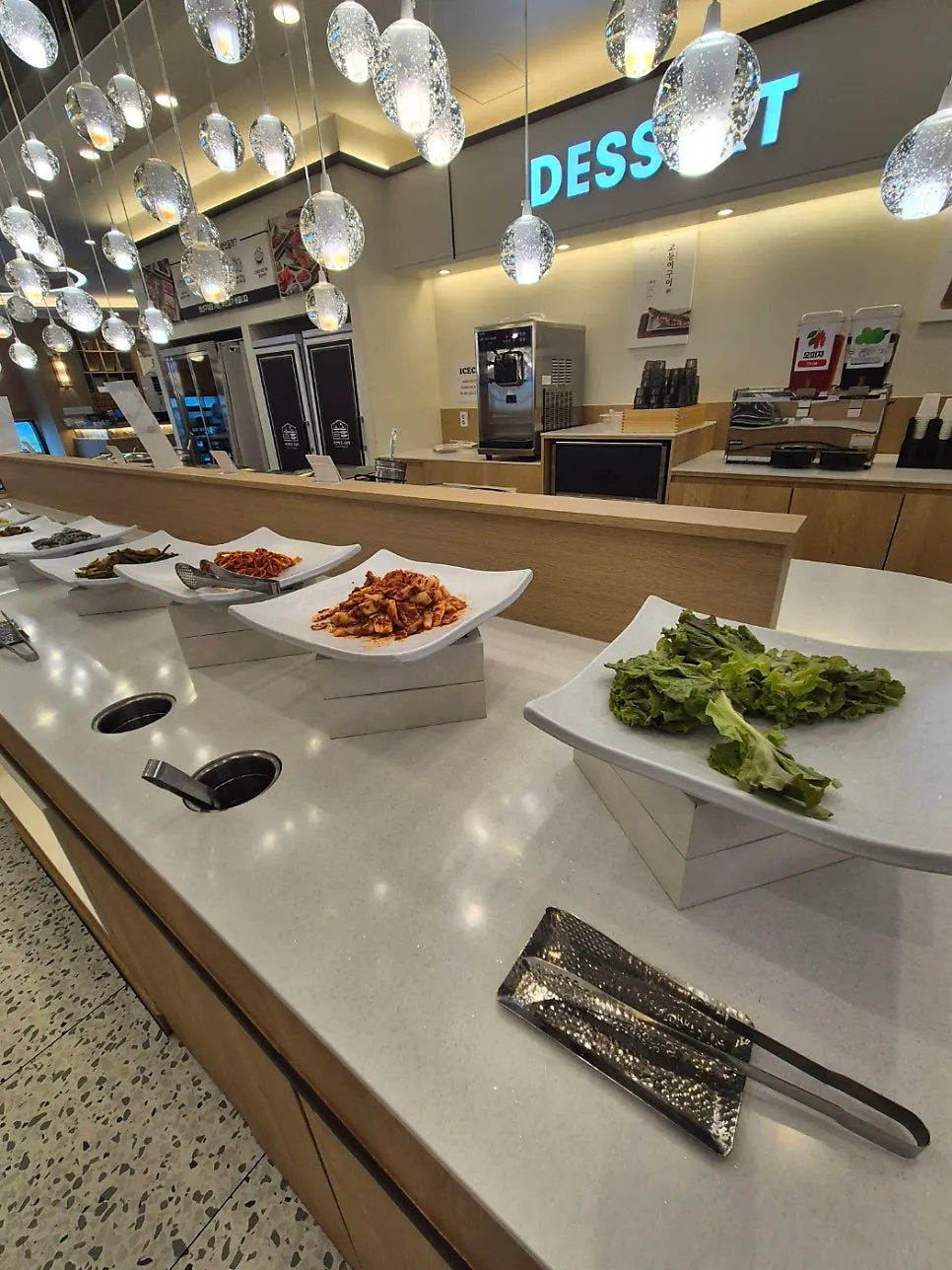 Self-serve bar with bean sprout salad and namul
