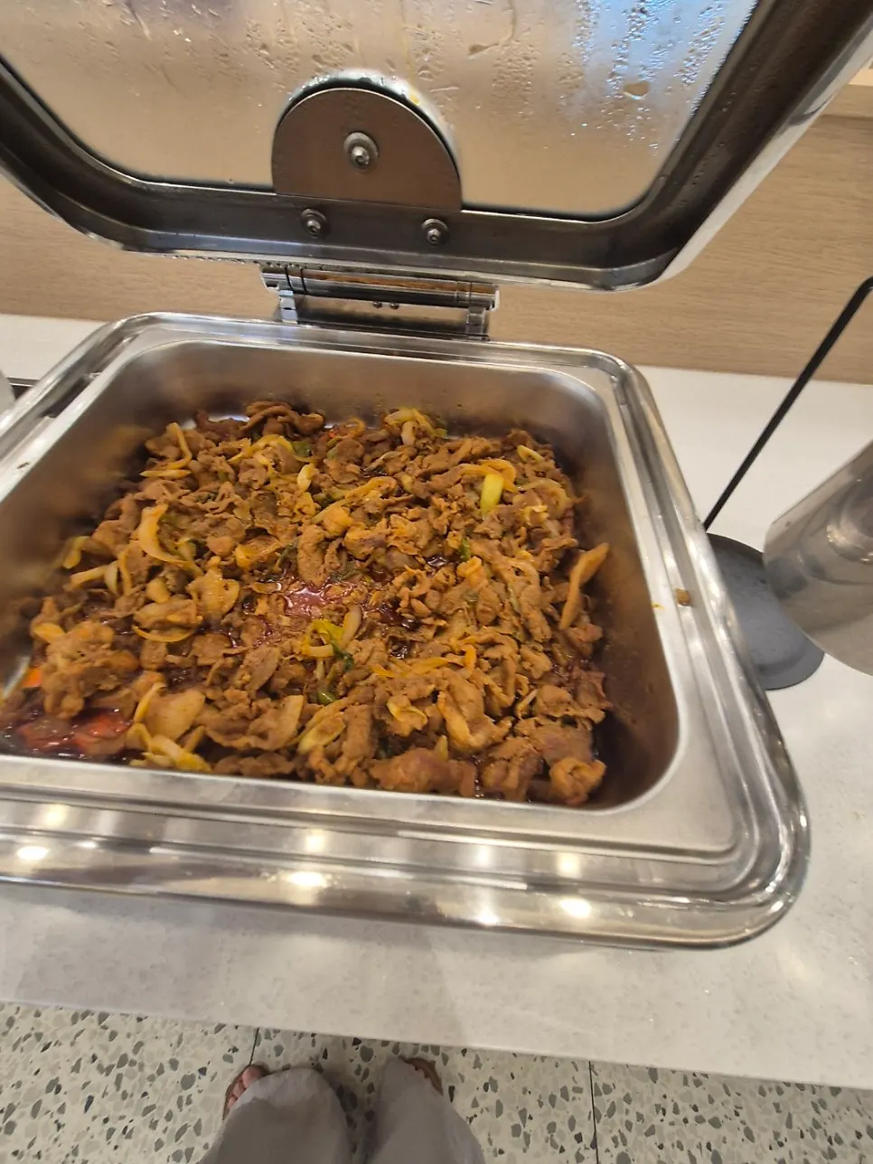 Self-serve bar with japchae and spicy sides