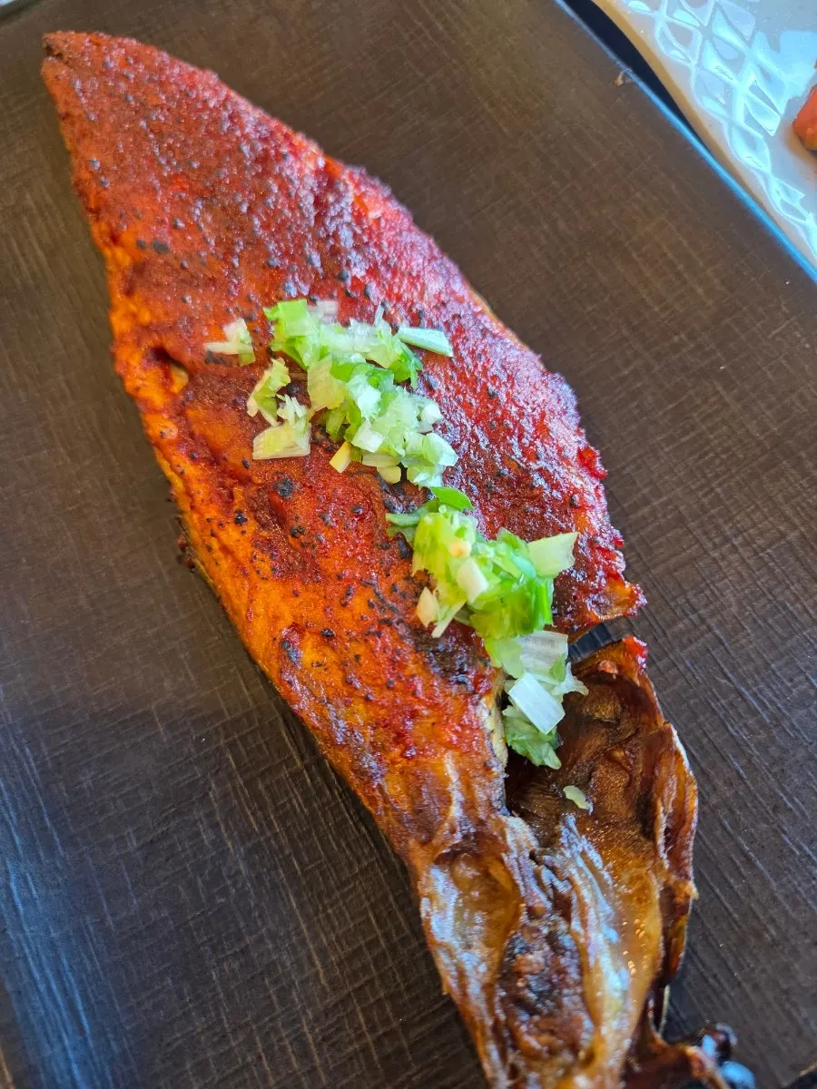 Seasoned mackerel and a grilled fish meal