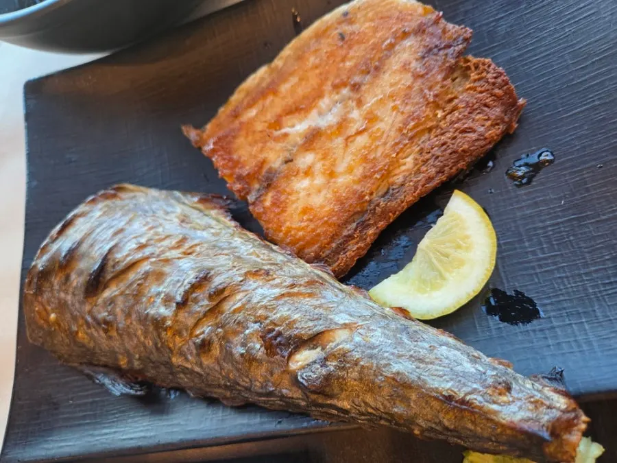 Crisp grilled fish and side dishes
