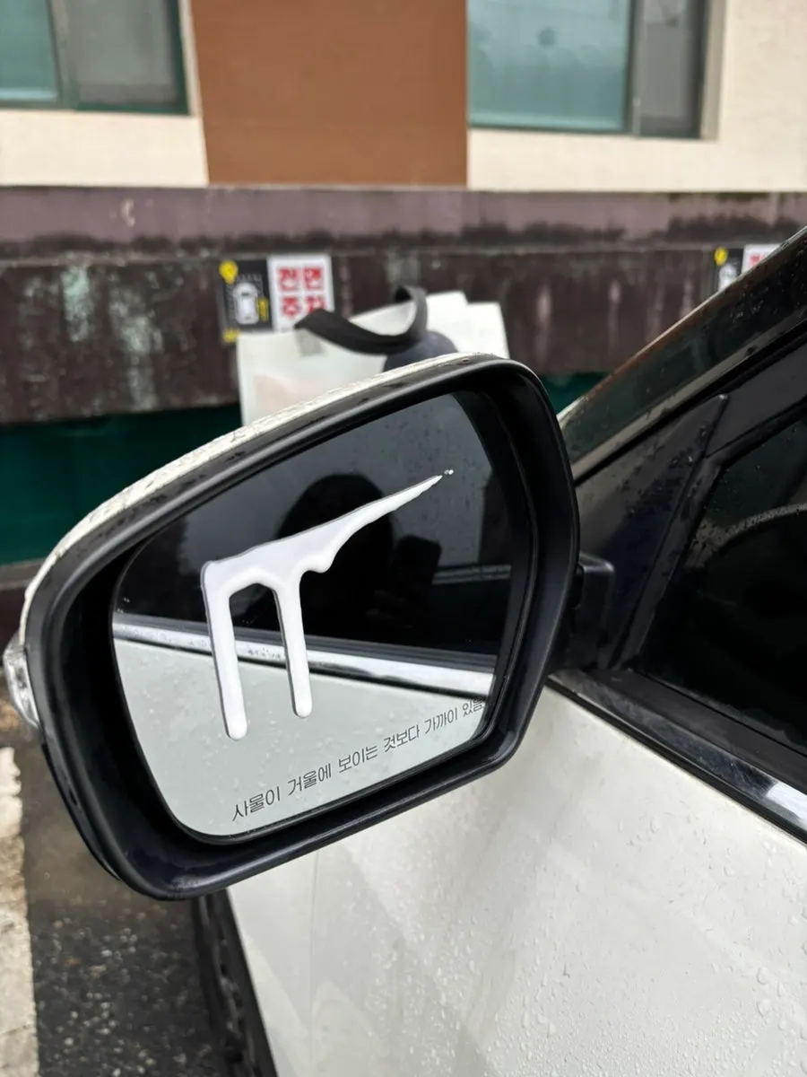 Cleaning a car window before film removal