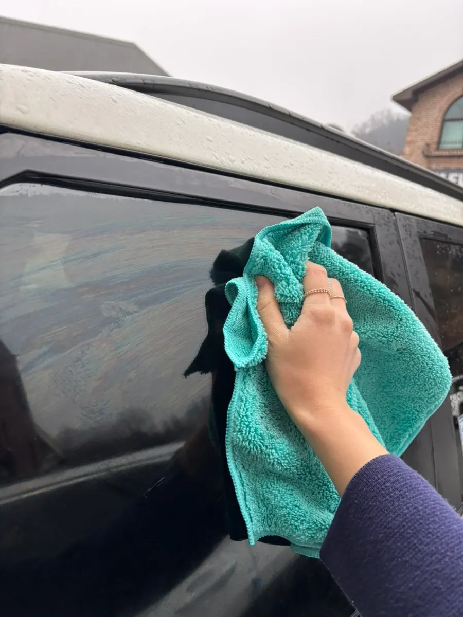 Car glass inspected after film removal and rinsing