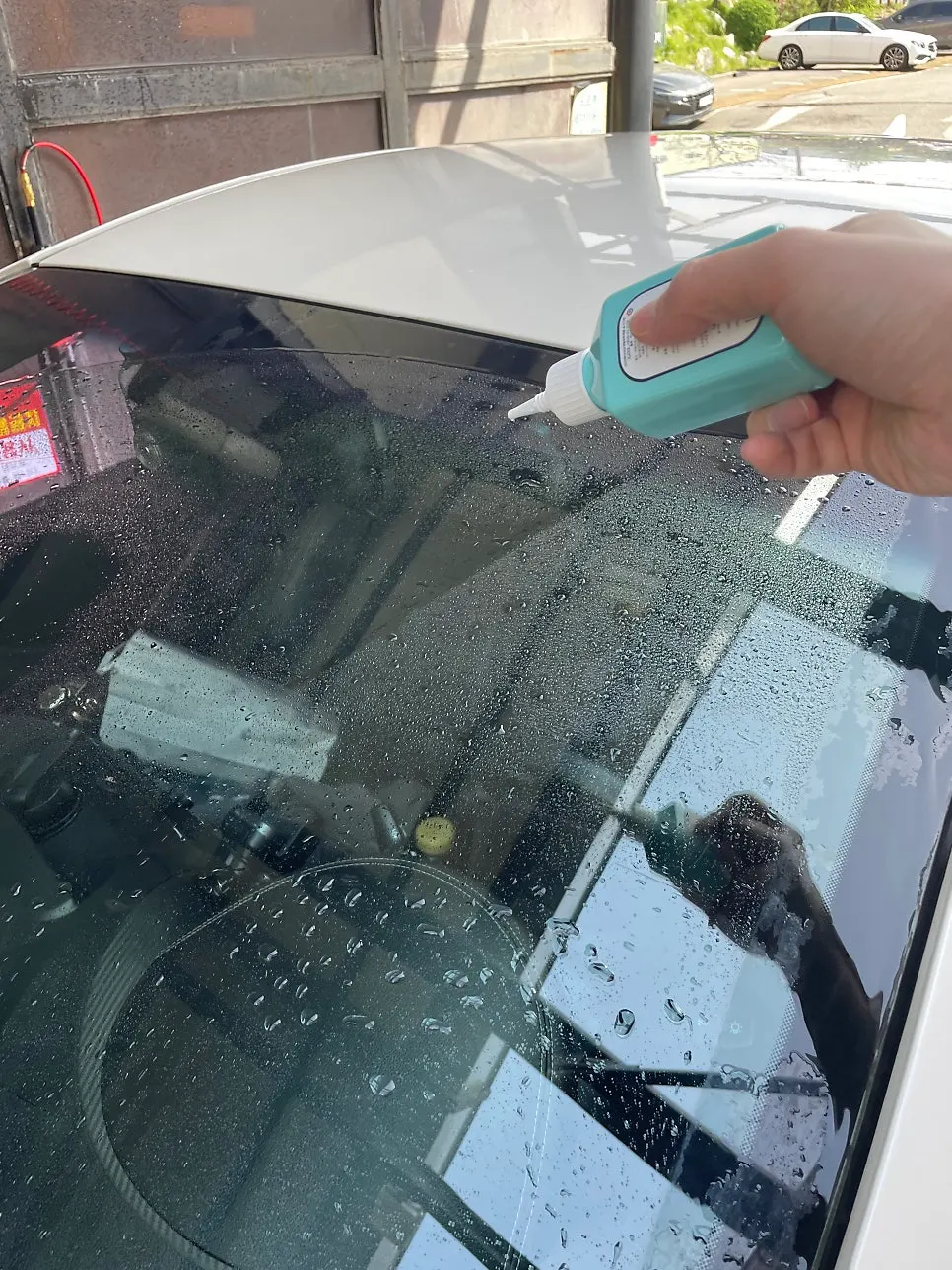 Car glass before product application at a self-service car wash