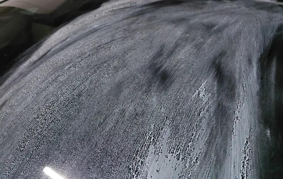 Car glass care process using the dedicated towel