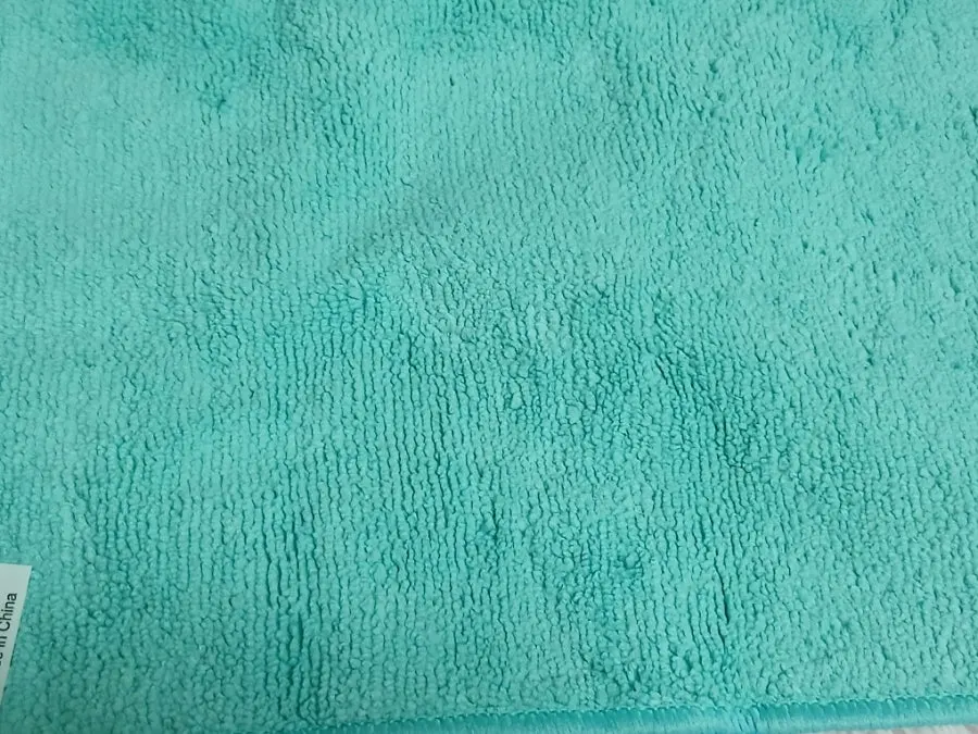 Spraying solution onto wet car glass