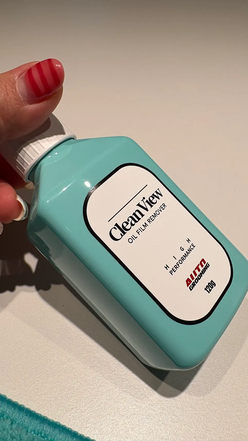 Bathroom glass cleaned with oil-film remover