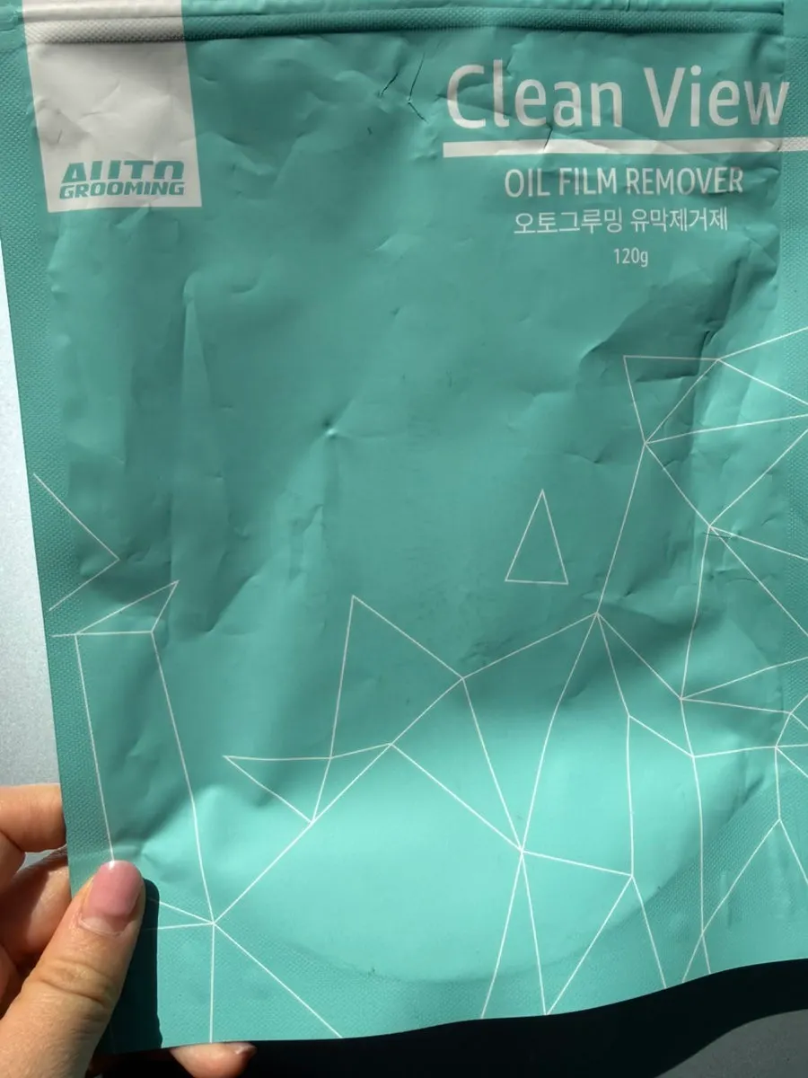 Clean View glass film remover used while washing off pollen