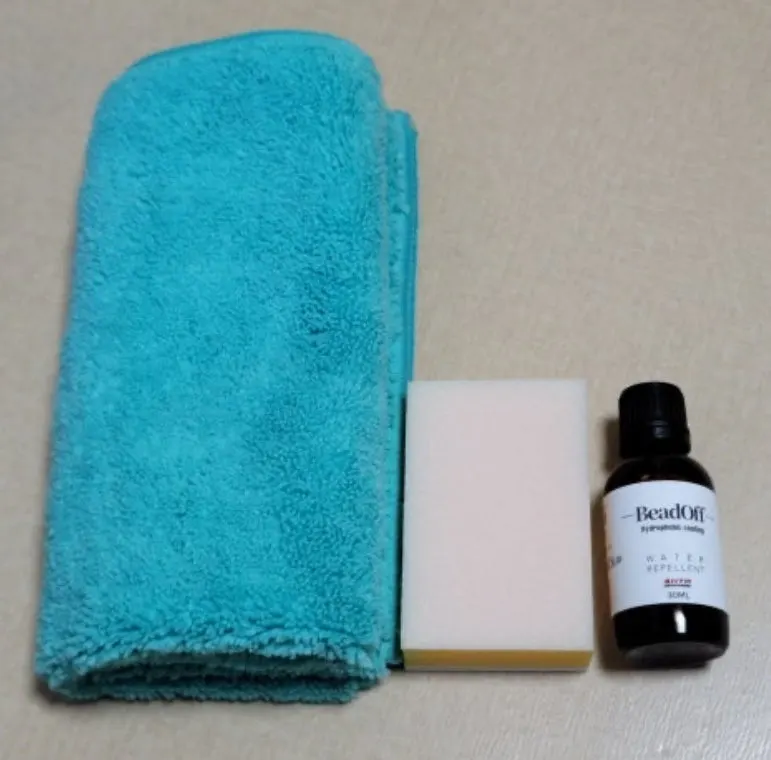 Car glass care using Clean View oil film remover