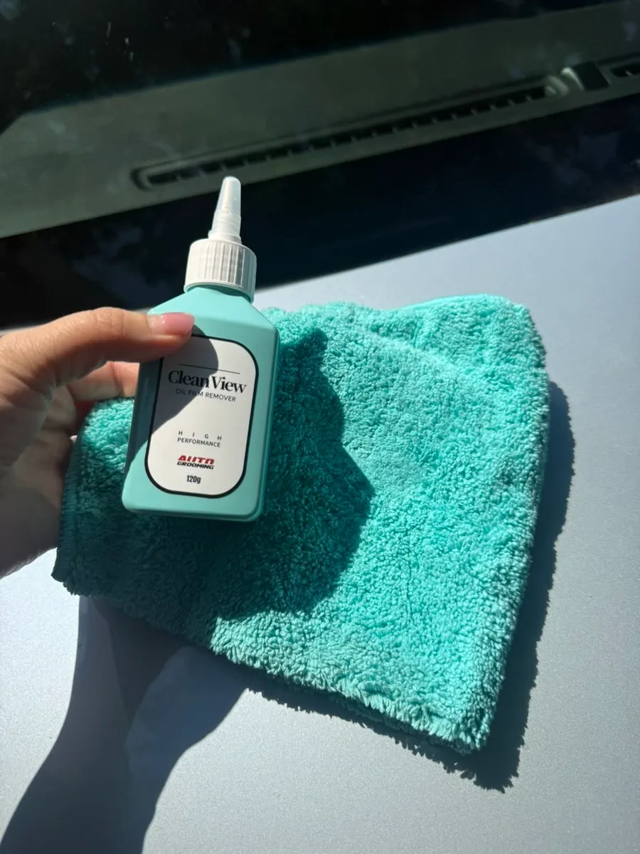Clean View glass film remover and included dedicated towel