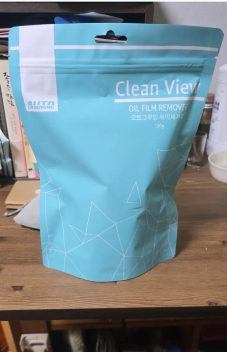 Car glass care using Clean View oil film remover
