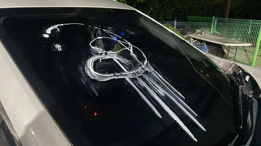 Car window with water remaining before applying oil film remover