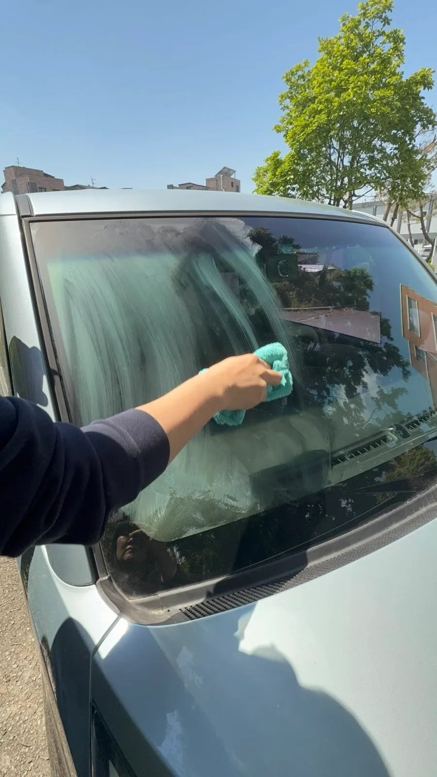 Car glass maintained with Clean View during a self-service car wash