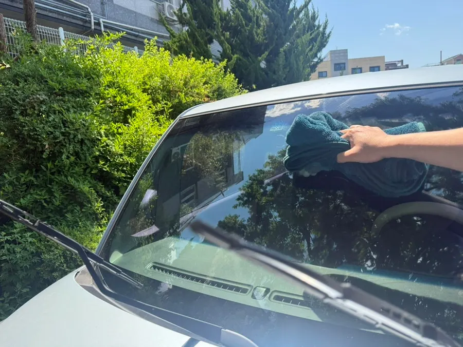Car glass after completing Clean View film removal and rinsing