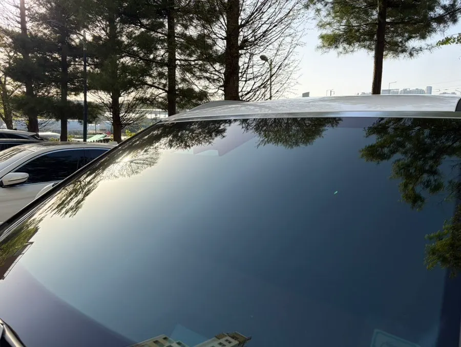Car windshield after oil film removal