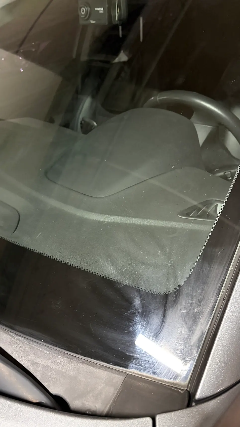 Car glass after using Clean View oil-film remover