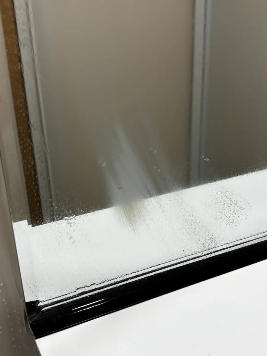 Cleaning glass coated with white oil-film remover