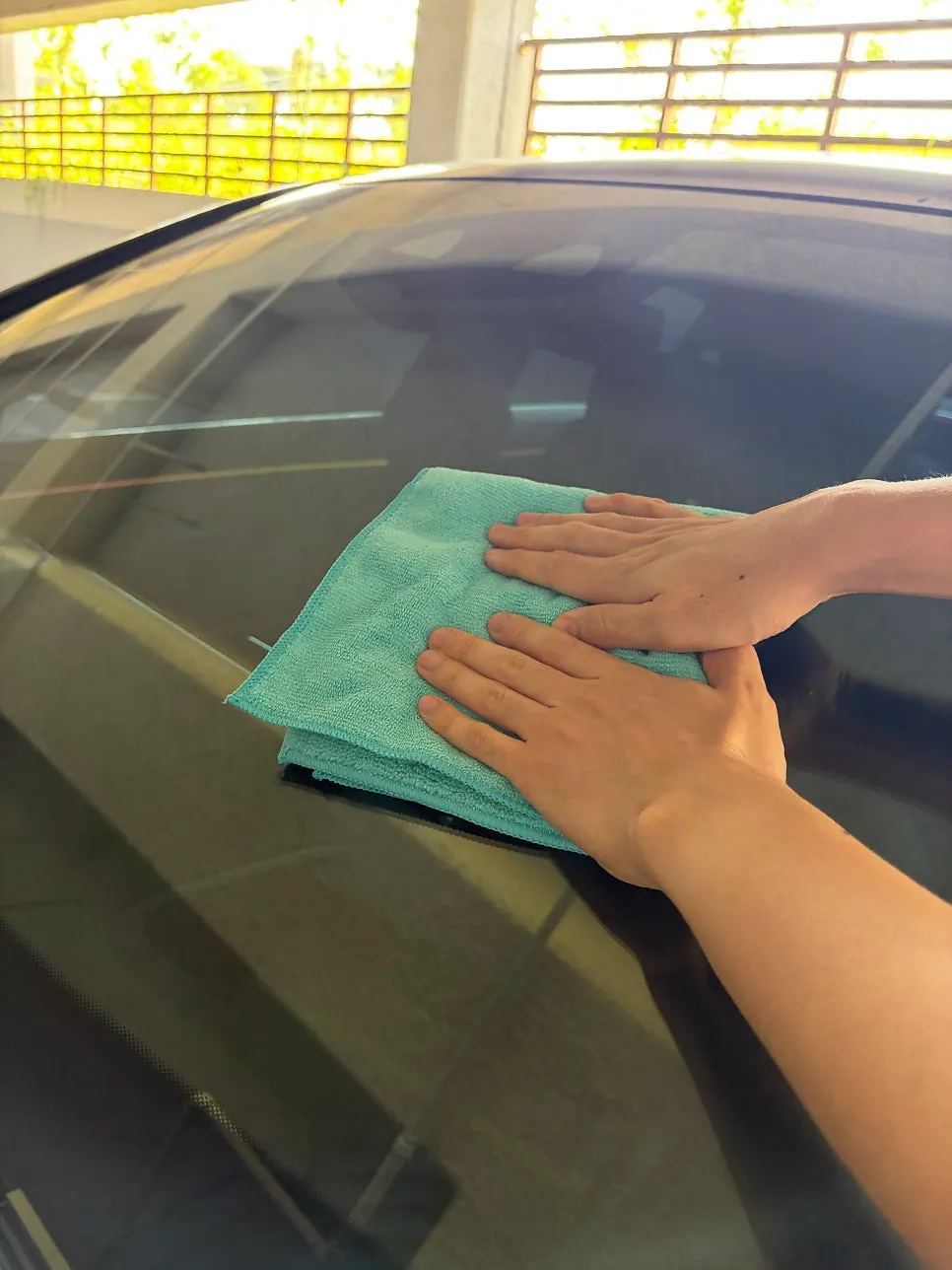 Small dabs of Clean View oil film remover applied to windshield