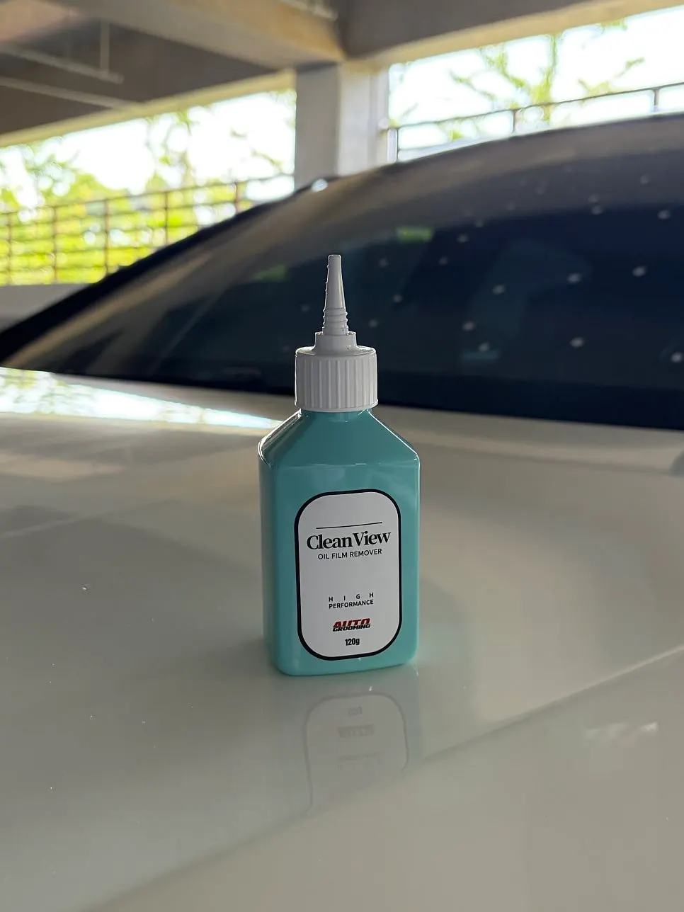 Windshield rinsed with water after oil film removal
