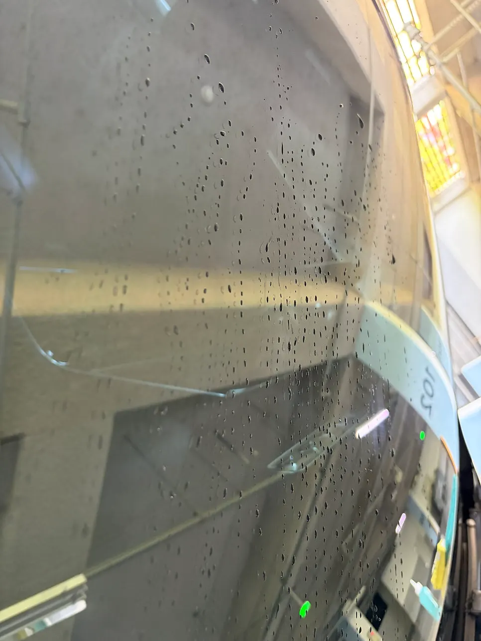 Before and after comparison of water droplets on the windshield