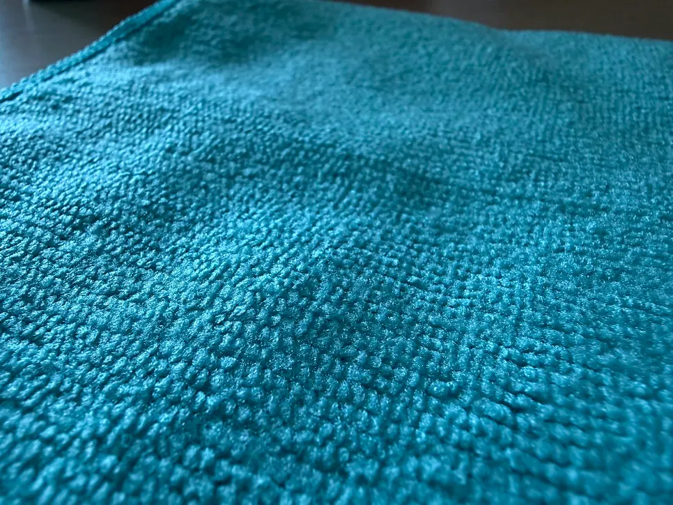 Windshield oil film remover kept on hand for self-carwashing