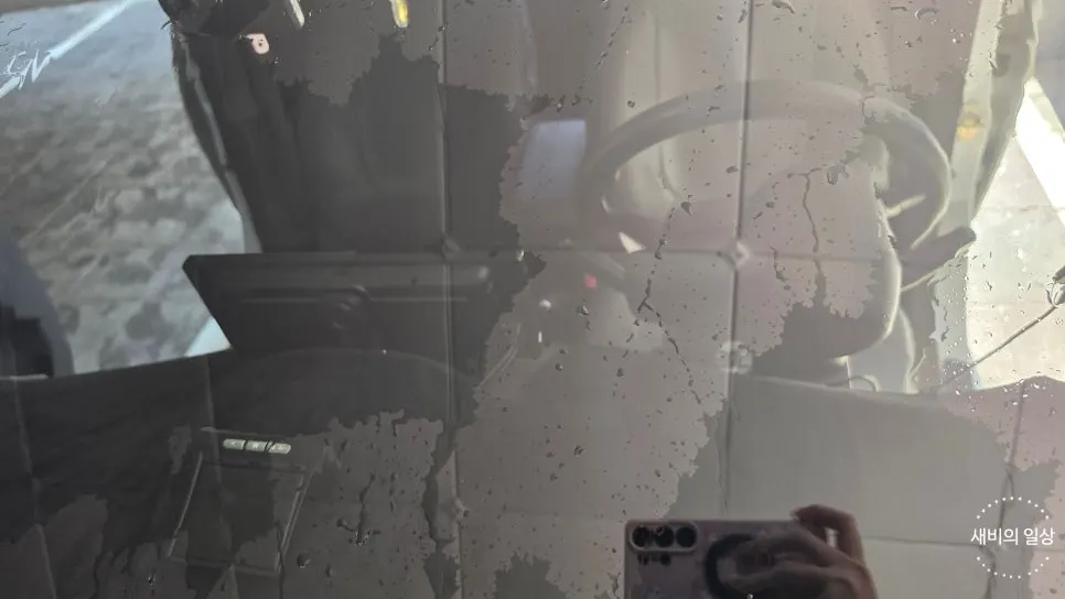 Car glass with oil film remaining in several areas