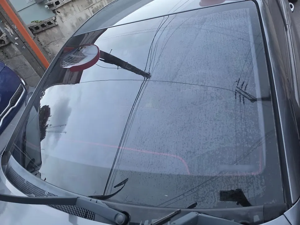 Windshield treatment process using Clean View oil-film remover