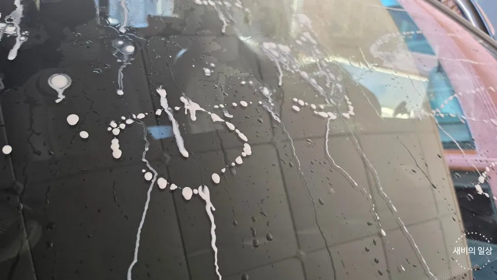 Preparing to use oil-film remover after washing the windshield