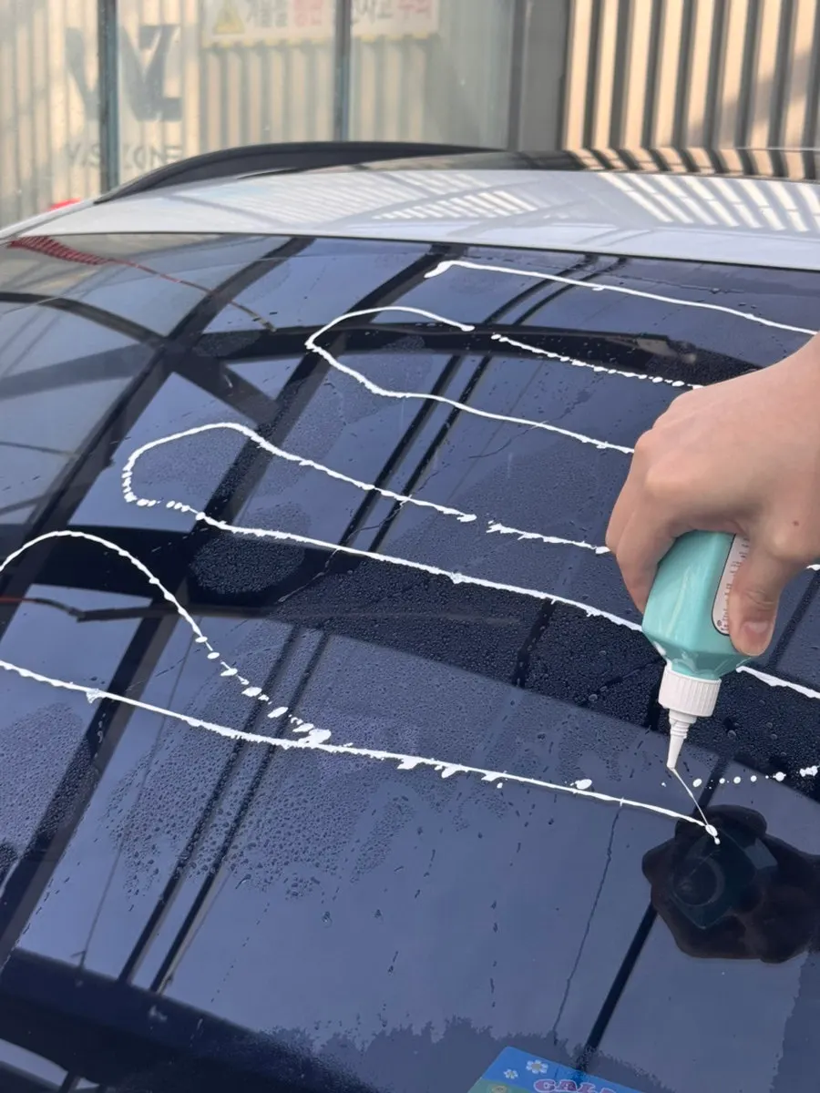 Inspecting the windshield before applying oil film remover