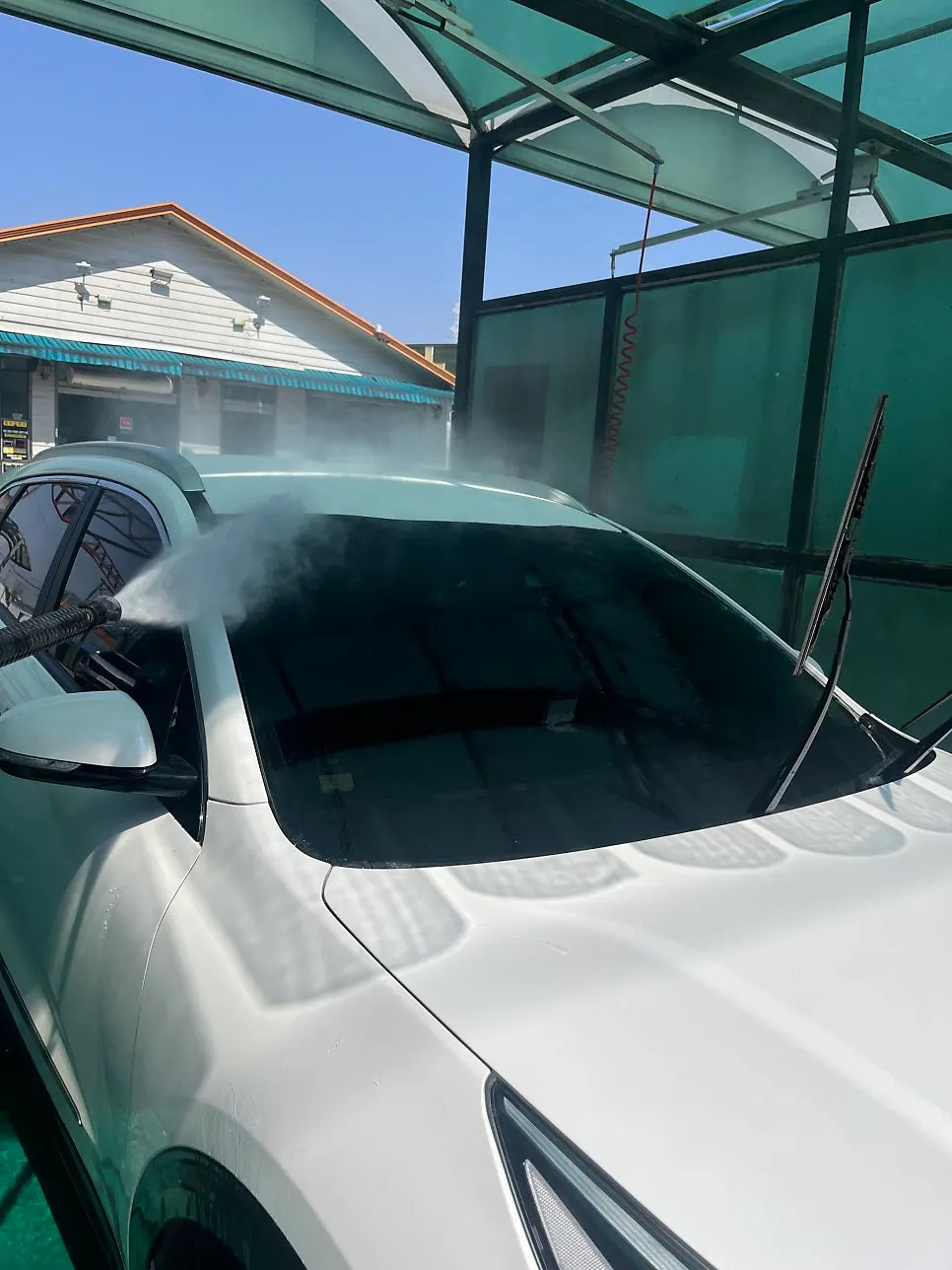 Washing a car windshield with Clean View
