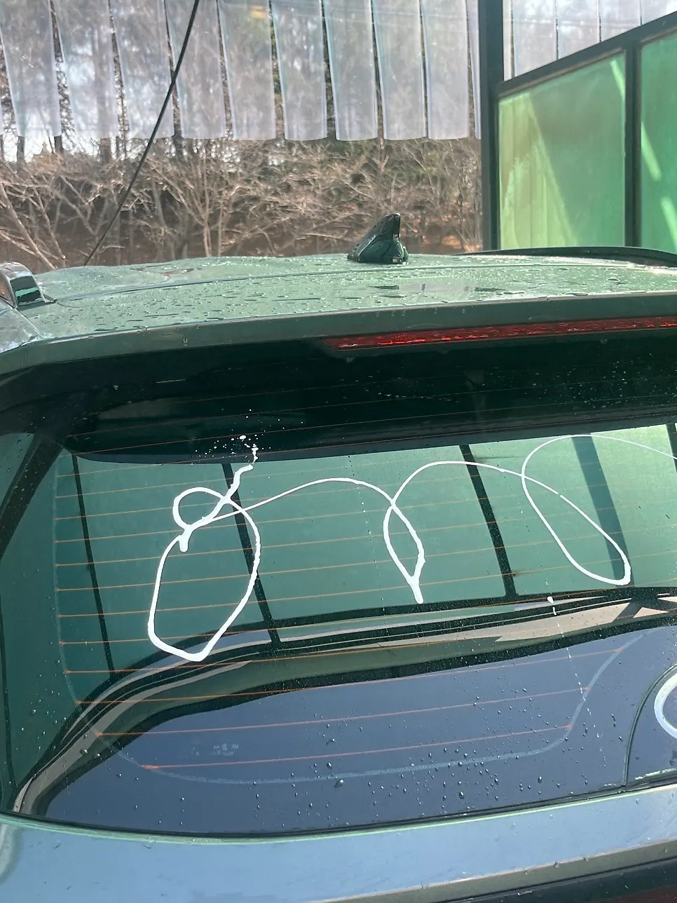 Car washing after oil film removal