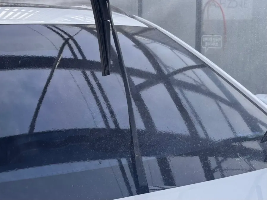 Windshield checked after oil-film removal and drying