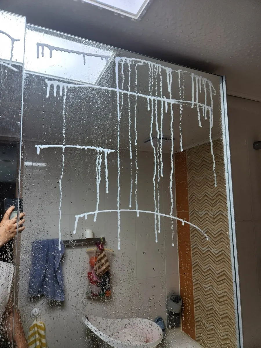 Oil-film remover applied to the bathroom surface