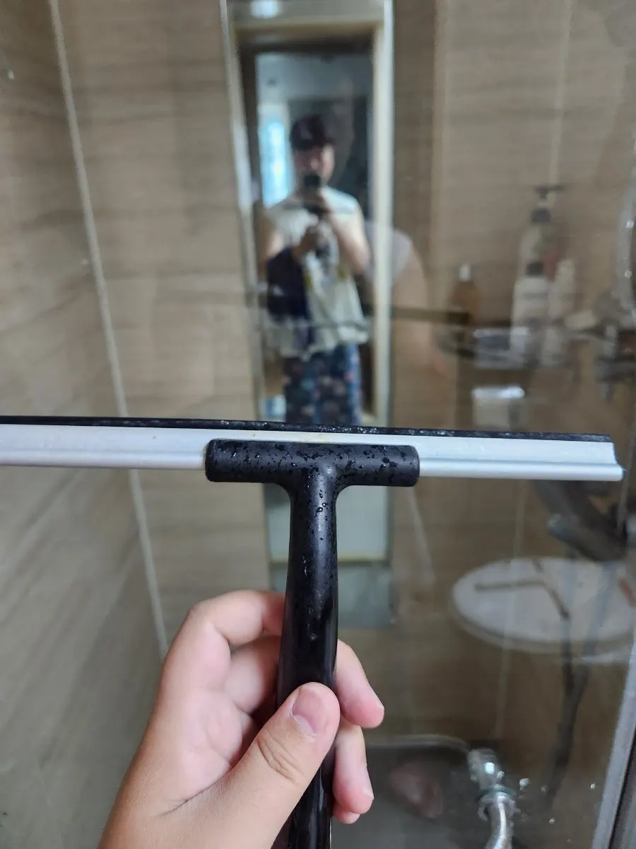 Main bedroom bathroom cleaning result and water-removal tool